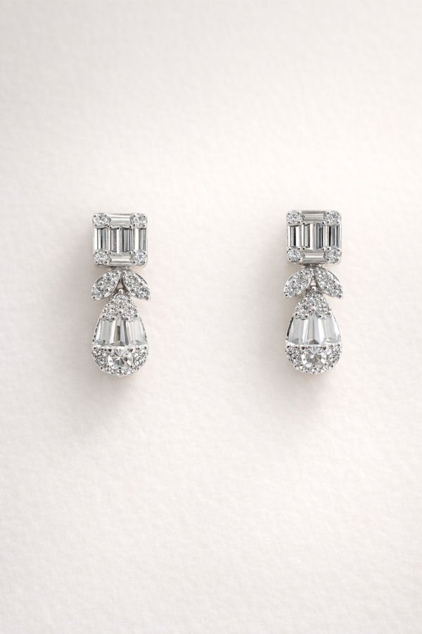 Aretes colgantes con diamante en oro
