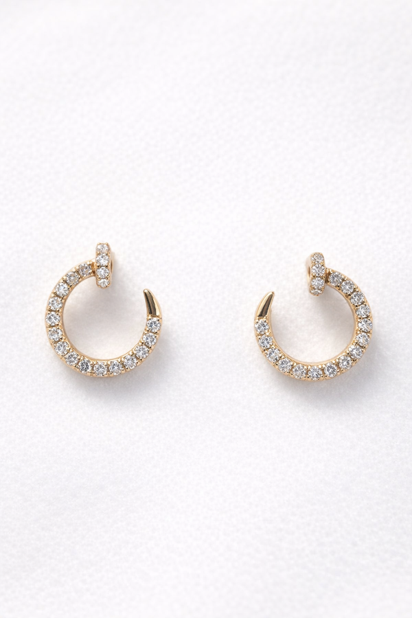Broqueles órbita con diamante en oro amarillo