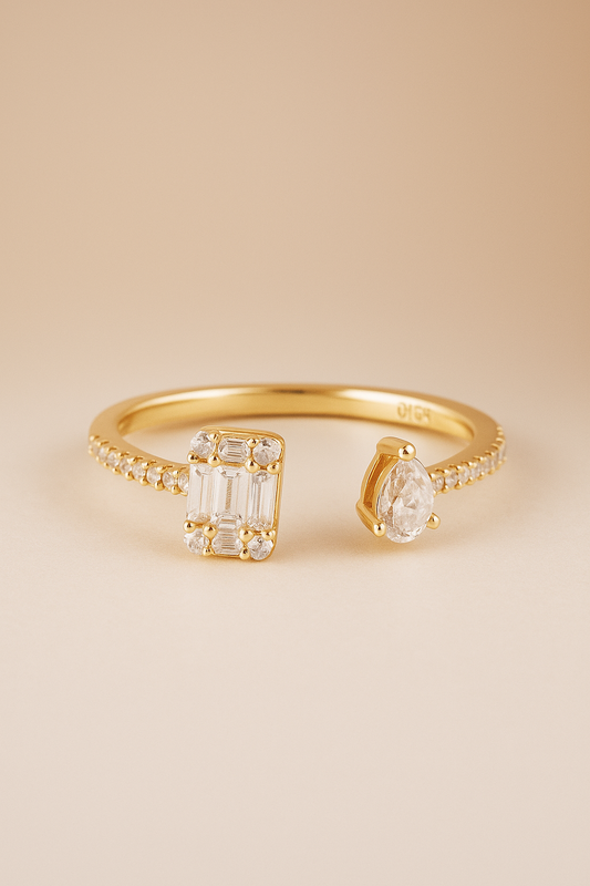 Anillo toi et moi con diamante baguette y pera en oro