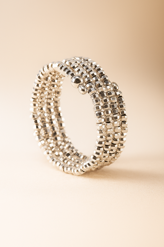 Anillo flexible infinity en oro blanco