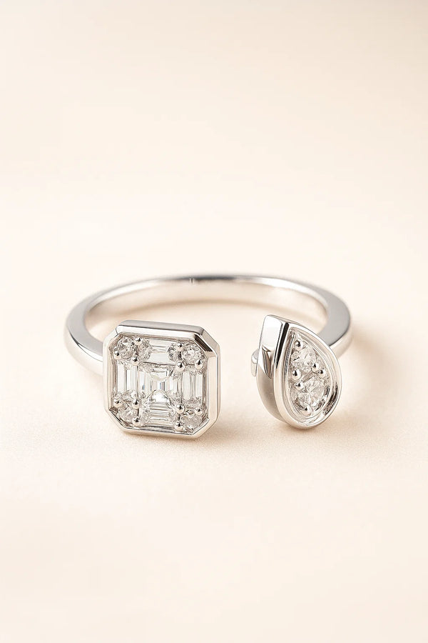 Anillo toi et moi con piedra pera y cuadrada en oro