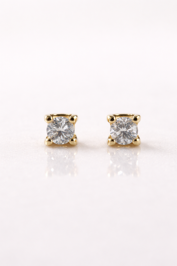 Broquel clásico con diamante en oro