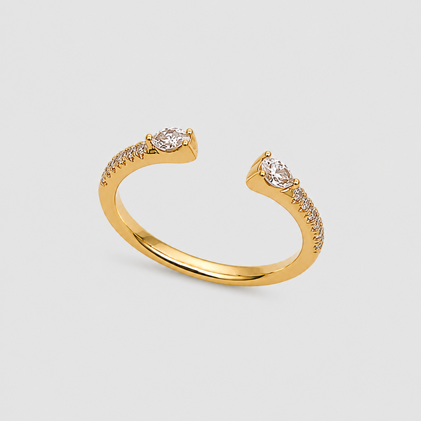 Anillo toi et moi con piedras de corte pera y marquesa en oro