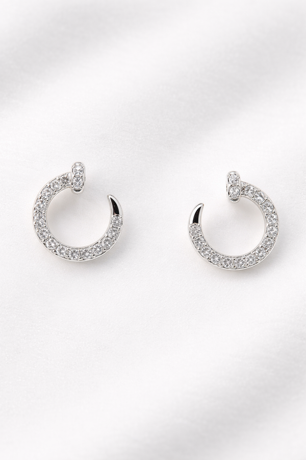 Broqueles órbita con diamante en oro blanco
