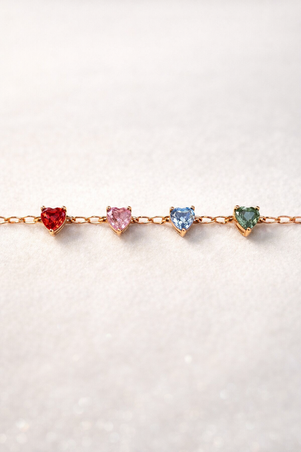 Pulsera de eslabones de corazón con zafiros multicolor en oro 18k