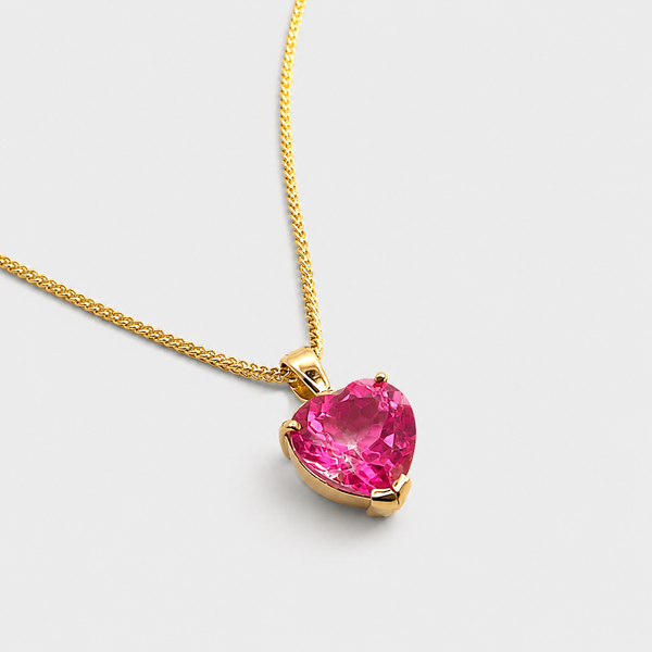 Dije de corazón con zafiro rosa en oro