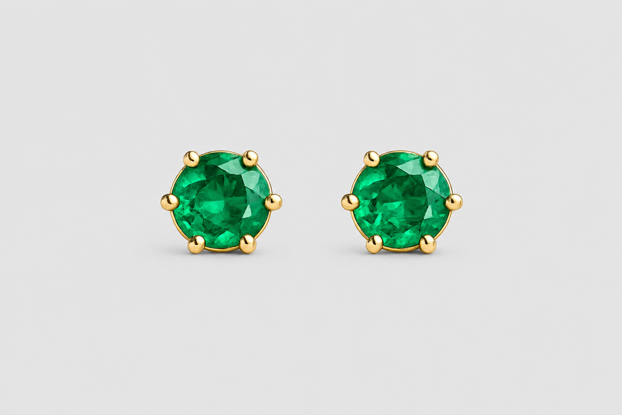 Broqueles solitario con esmeralda de 4.7 mm en oro
